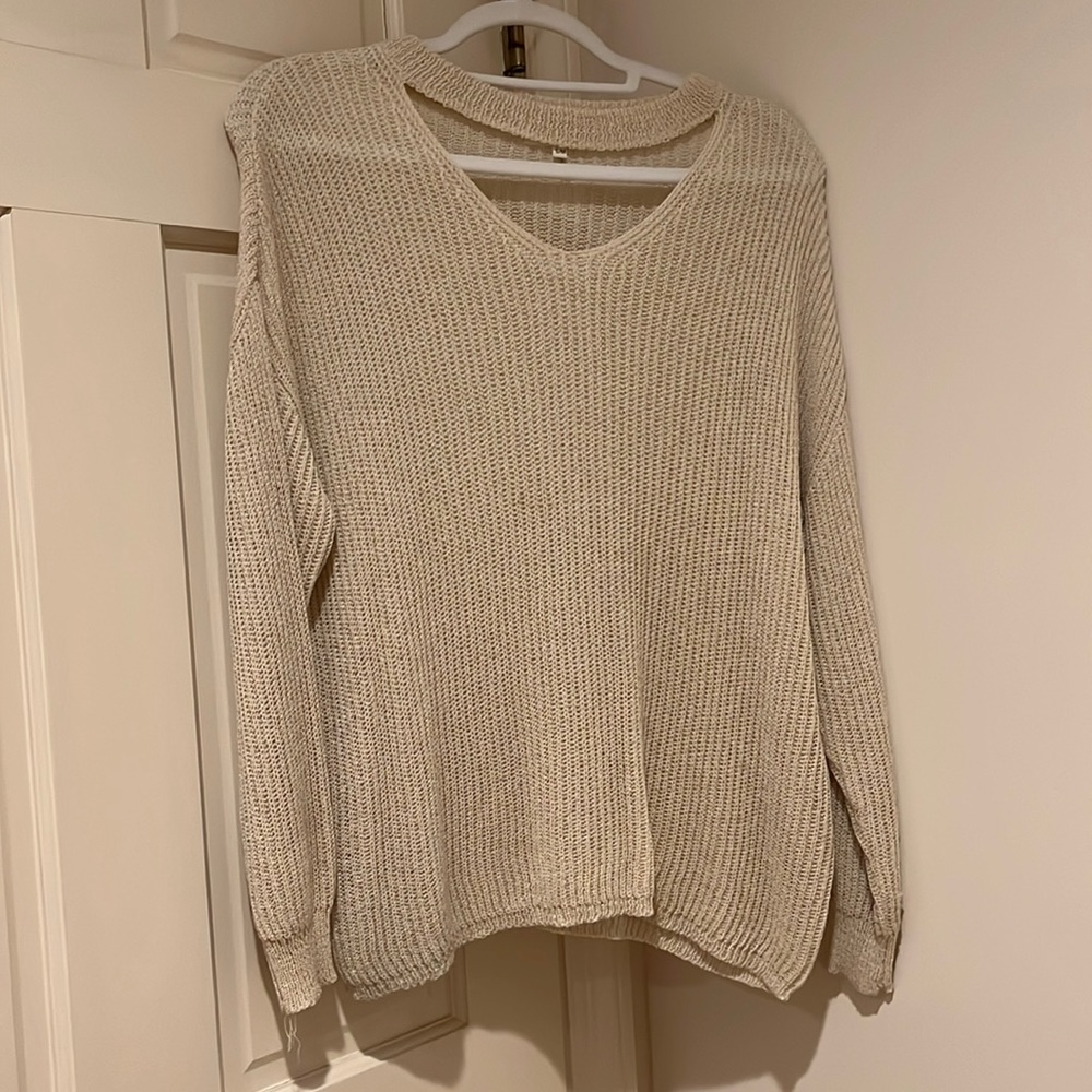 Sweater with cut out top